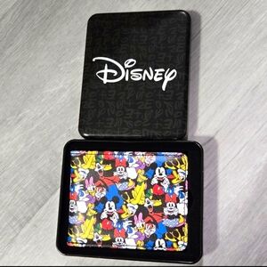 Brand new with Disney logo tin ID slot4 credit card slots